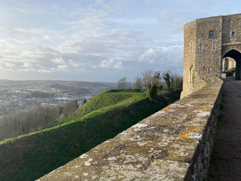 Walls of Dover Castle with view looking over town.