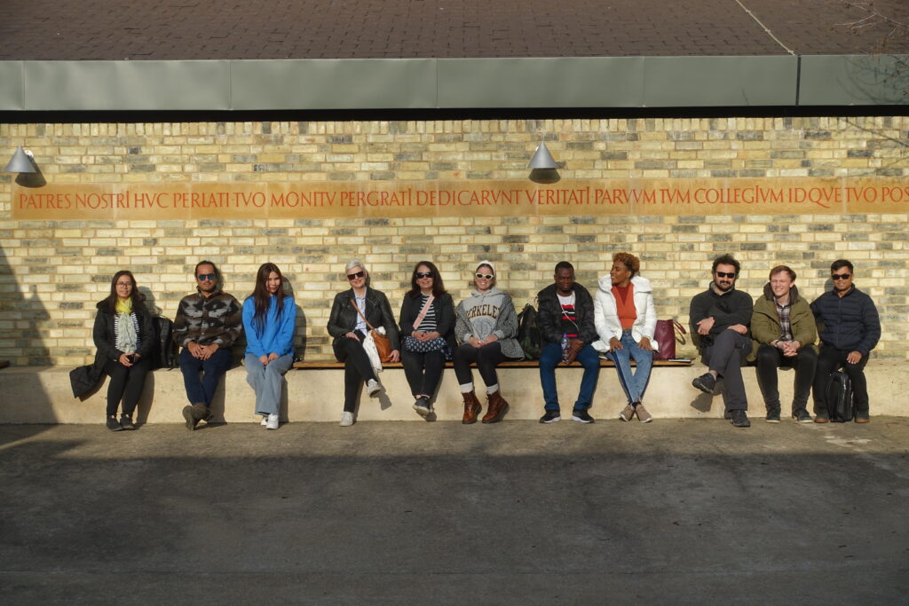 ITP fellows sit in a line