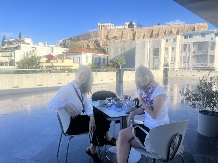 Meltem sitting with ITP colleague Yolanda