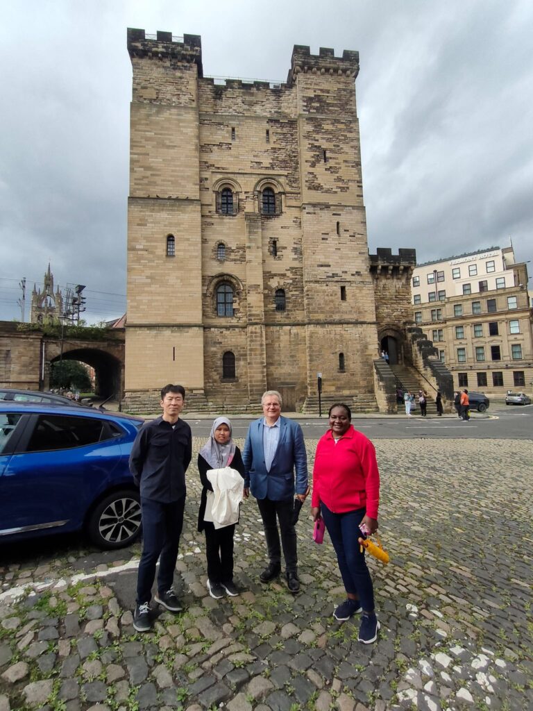 ITP fellows in Newcastle with Bill Griffiths. (L_R) Gao Rui, Malissa Kadir, Bill Griffiths, Rodah Lange)