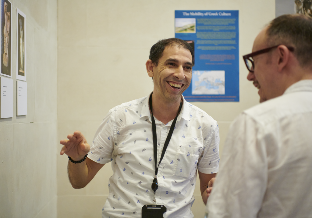 Aymen Chihaoui showing a guest his object in focus display