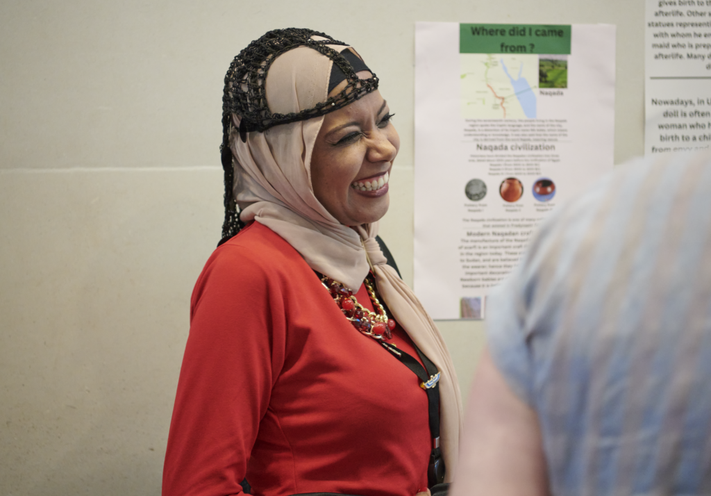 ITP fellow Dina Gohar smiling at a person out of view