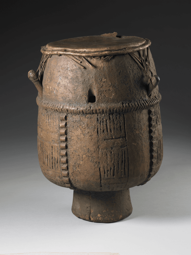 Akan drum: drum made of wood, skin and cord. 