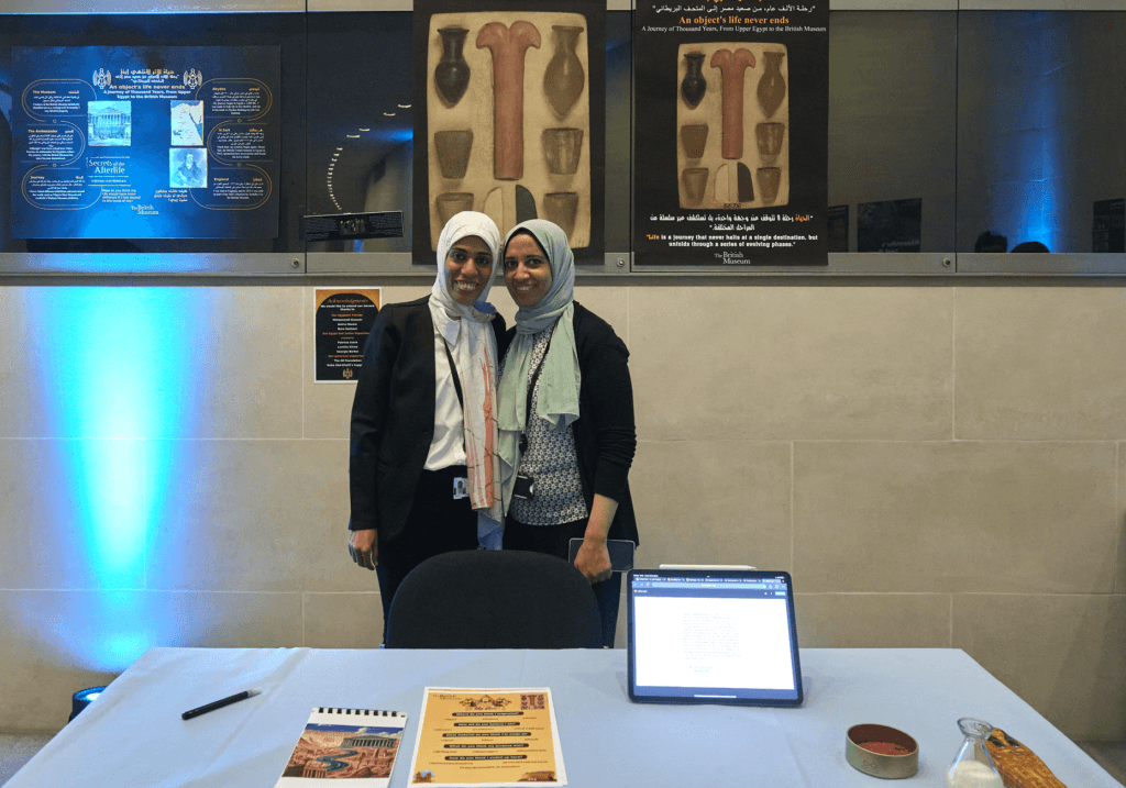Object in focus Egypt and Sudan group standing their their project
