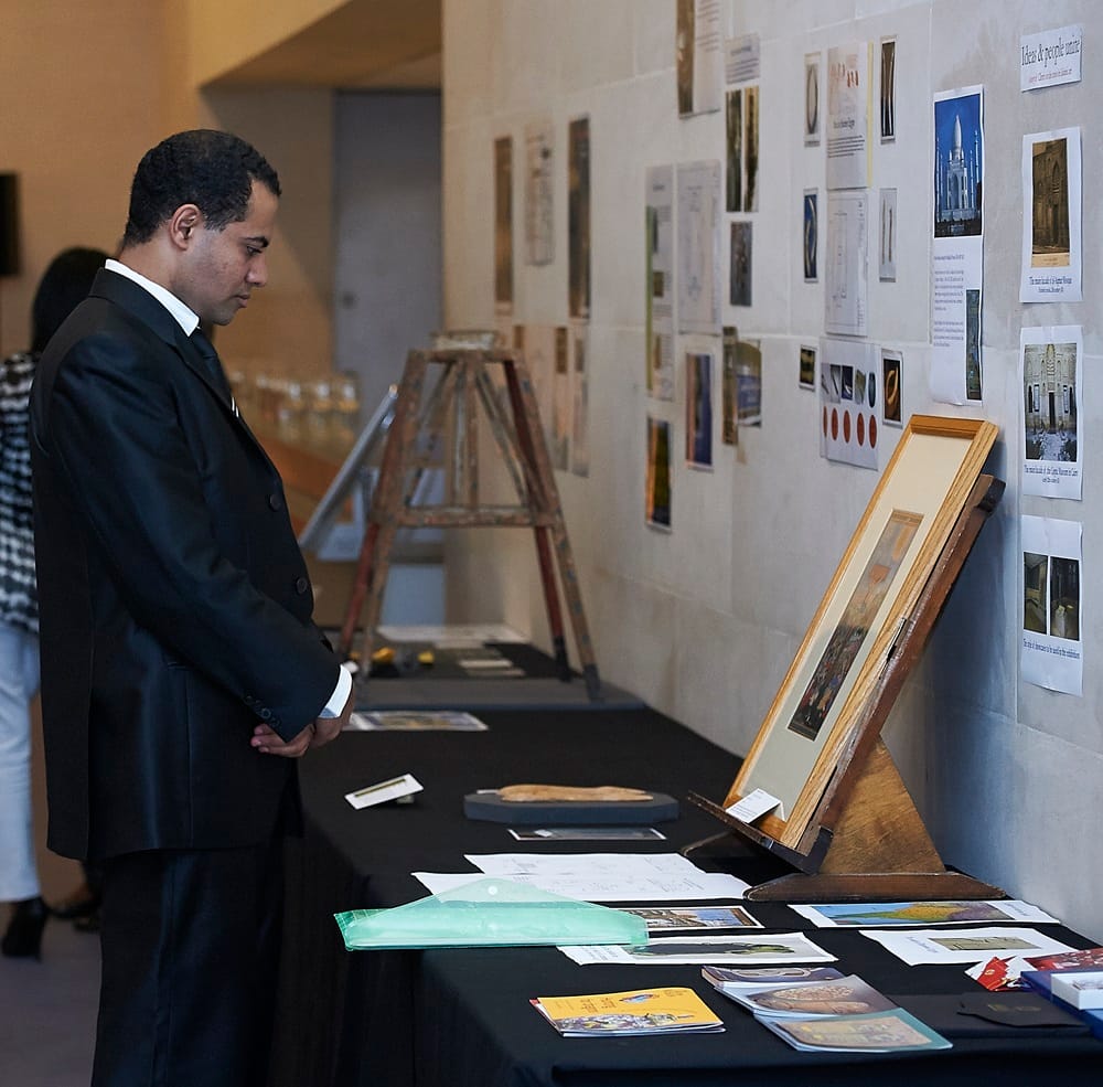 Photo of a man looking at a display