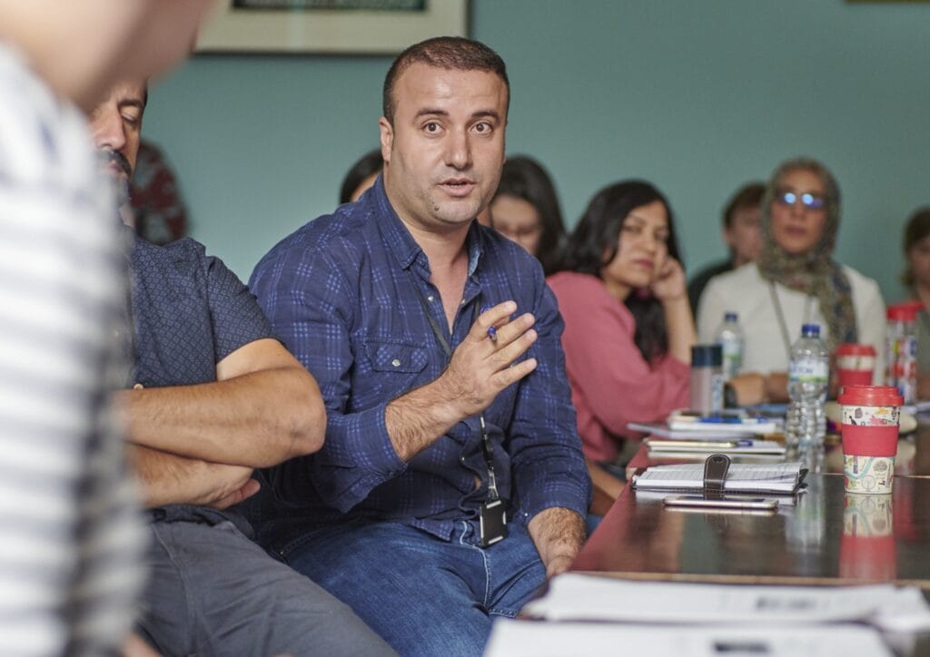 Photograph of a man talking