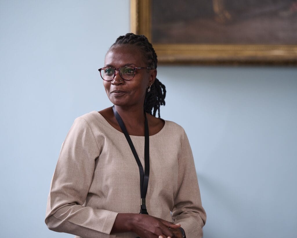 Photograph of a woman giving a presentation