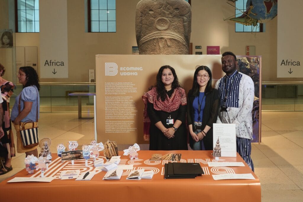 Komal Pande, Li Yinchong, Deemanka Jayakodi standing with their object in focus display
