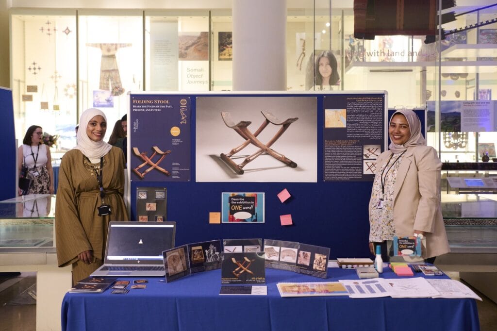 Gehad Ali and Shimaa Gomaa stand with object in focus displays