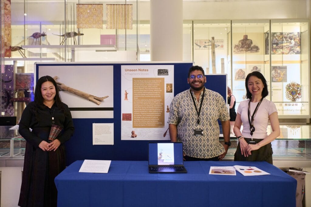 Paint Wongkhaluang, Vineet Kajrolkar, Thuy Pham standing with Object in focus display