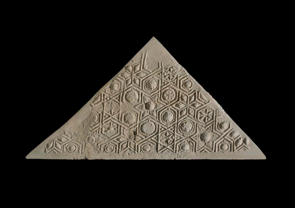 Stucco wall panel; moulded plaster with decoration.